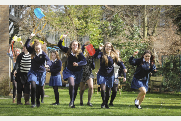 07/03/14 St Mary's School flying kites across its ground to mark International Women's Day on Saturday. Picture ltr Charlotte Connell 14, Ella Harrison 14, Celeste Cottham-Cartledge 15 and Maegan (correct) Curtis-Griffiths 15.  Picture: Keith Heppell