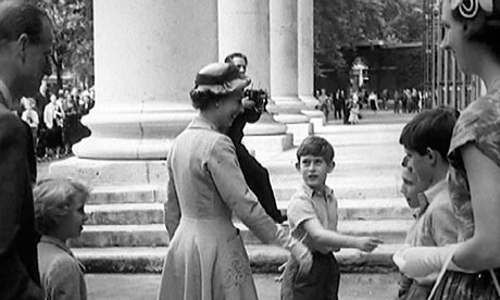 Prince Charles takes his mother to sports day at Hill House school, west London, in 1957.